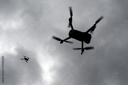 Drone is flying in the sky. Operator controls the drone.  War in Ukraine