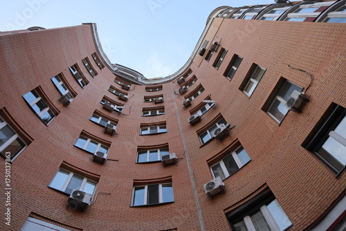 curved modern high-rise building with windows