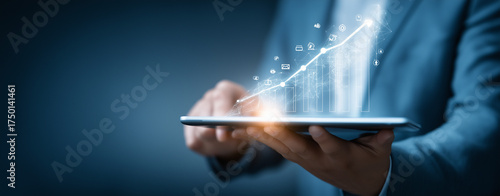 Businessman analyzing and assessing business data for long term investment growth goals and company finance balance, analysis of Digital marketing, CRM,Strategy, consultancy and planning of targets.