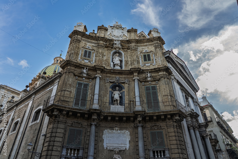 Fototapeta premium Palermo, the historic Sicilian capital city, featuring the monumental city gate, Palermo Cathedral, ornate baroque architecture, and charming narrow streets filled with history, Sicily, Italy