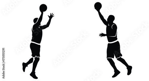 Two basketball players in silhouette preparing to shoot the ball