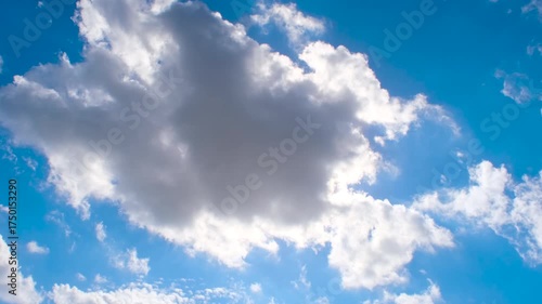 Timelapse of Sun Shining Through Clouds in Blue Sky. Sun Rays Breaking Through Moving Clouds – Sky Timelapse. Time Lapse of Cloudy Sky with Sunlight.