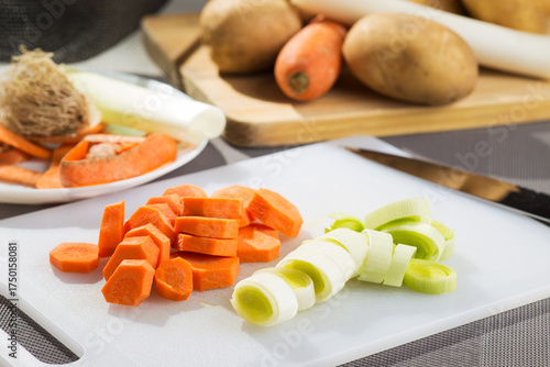 Sliced ​​leek and carrot on a cutting board