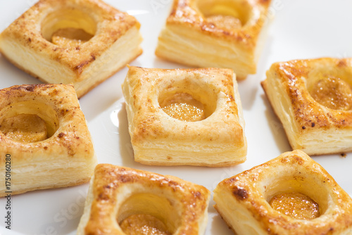 Puff pastry squares with apple inside,