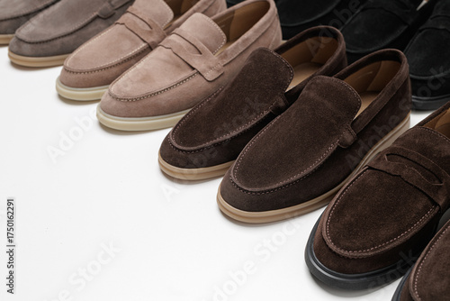 Schilderij op canvas Men’s suede loafers collection on neutral background for fashion retail and e co