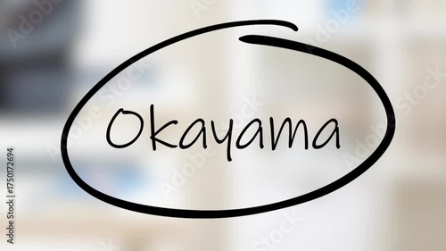 Okayama Handwriting using black marker on glass