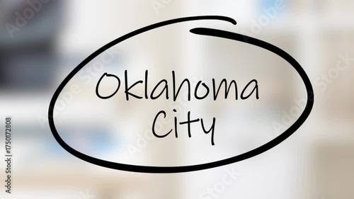 Oklahoma City Handwriting using black marker on glass