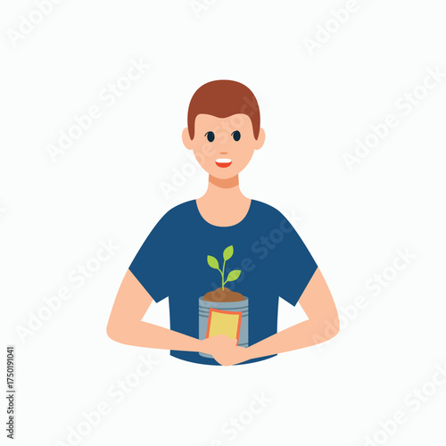 Young man happily holds a small plant growing out of a reused metal can, illustrating the concept of upcycling and saving the planet