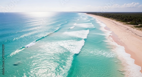 Serene Tropical Paradise: Turquoise Waves Gently Kissing a Pristine Sandy Beach with Lush Greenery