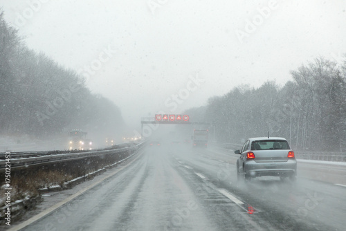 Wallpaper Mural highway with cars in winter with snow fall Torontodigital.ca