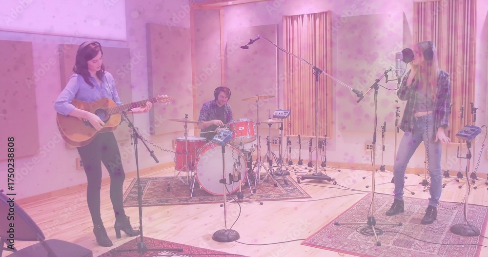 Fototapeta premium Performing music trio recording in sound studio, with acoustic guitar, drum kit and microphone