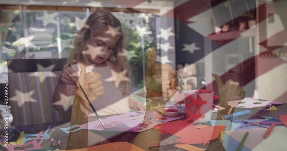 Naklejka premium Dipping paintbrush and applying color, girl painting paper at home craft table, with paint palette