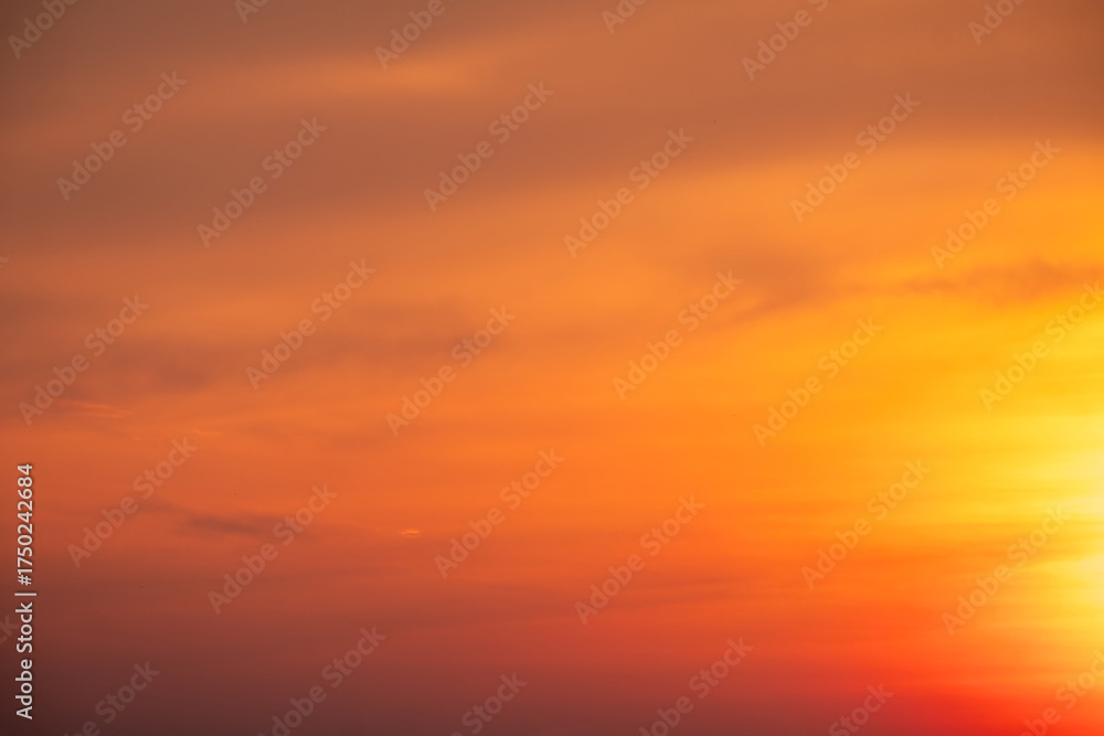 Fototapeta premium Beautiful , luxury soft gradient orange gold clouds and sunlight on the blue sky perfect for the background, take in evening,Twilight, Large size, high definition landscape photo