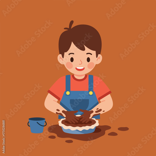 Child wearing overalls happily plays with mud in a pie tin