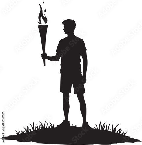 Silhouette of a man holding a flaming torch on grass