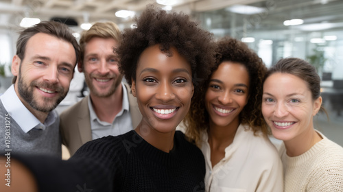 Wallpaper Mural Diverse group of employees taking group selfie in modern office Torontodigital.ca