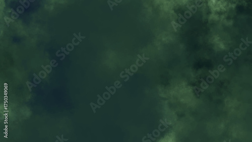 Dark and moody forest green smoke or cloud texture background. Abstract deep teal or dark emerald grunge surface.