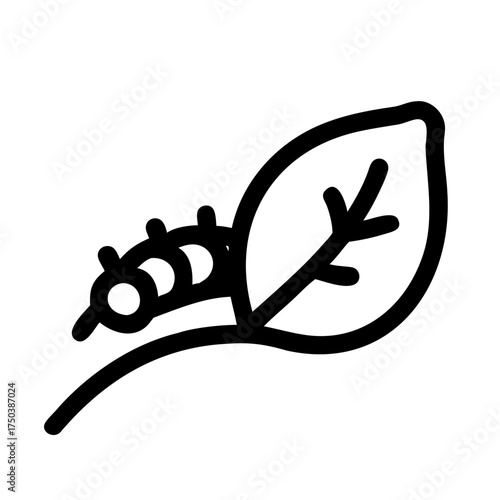 A close up of a black cat s face with bright green eyes looking directly at the camera with a soft blurred background