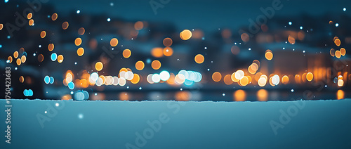 Blurred bokeh lights and a sparkling white snow background with the night city lights in the blurry backdrop.