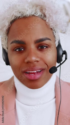 Portrait of African American supportive call center representative using a headset, displaying varied expressions of confidence warmth and engagement while assisting clients over video and phone