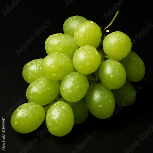  fresh green grapes on black background 