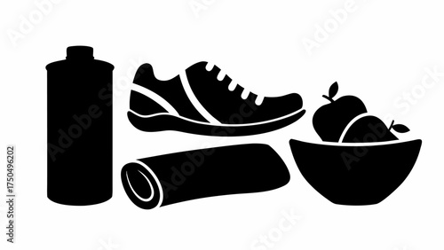 Fitness essentials for healthy lifestyle and wellbeing, including water bottle, towel, sneakers and a bowl of apples