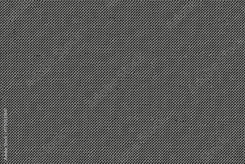 Photography Detailed texture of a fine wire mesh or metal grid against a dark background