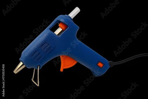 Mini hot glue gun with trigger and cord, isolated single object, transparent background, realistic detail.