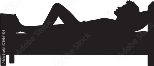 Silhouette of a person lying on a bed with head resting on hands