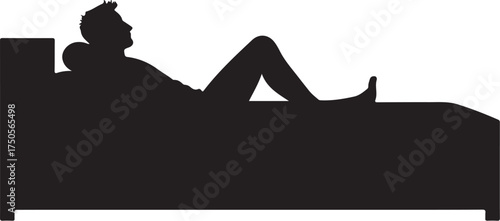 Silhouette of man resting on bed with head on pillow
