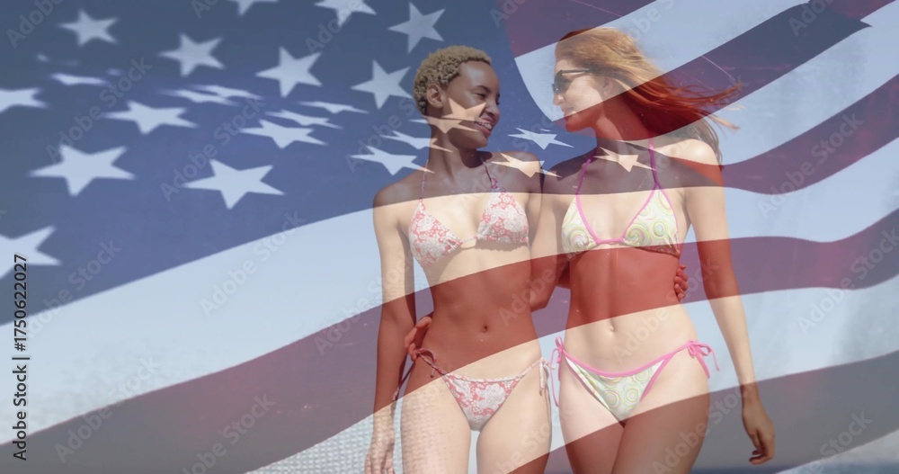 Naklejka premium Walking two friends arm in arm along beach shore, with patterned bikinis and American flag overlay