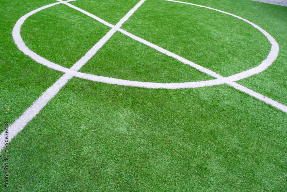 Obraz premium green artificial grass turf with white line for sports field background texture