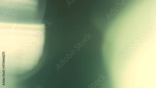 Slow motion real lens flare through glass effects for overlay or transition