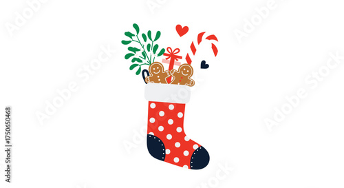 A festive red and white polka dot stocking filled with Christmas treats and greenery.