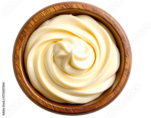 Creamy yellow mayonnaise swirl in a rustic wooden bowl isolated on transparent background