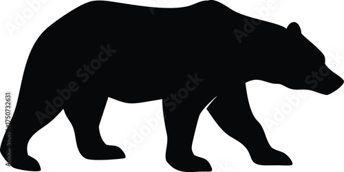 black silhouette of a bear walking 
