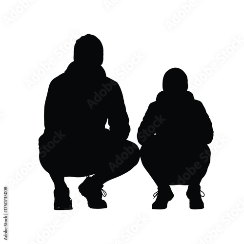 Silhouette of a gymnast in a handstand position with one leg extended upwards on white background