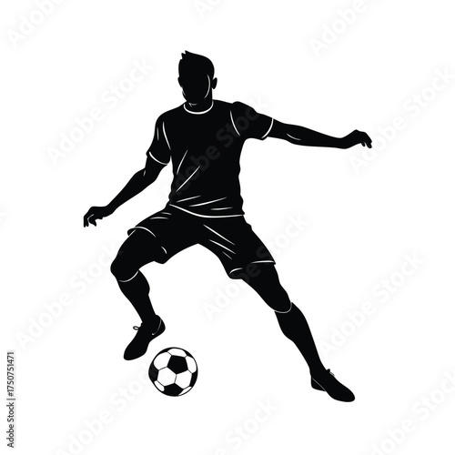 Silhouette of a soccer player dribbling a ball football