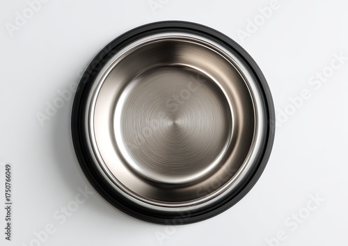Top-down view of a round, brushed metal bowl with a dark-colored rim
