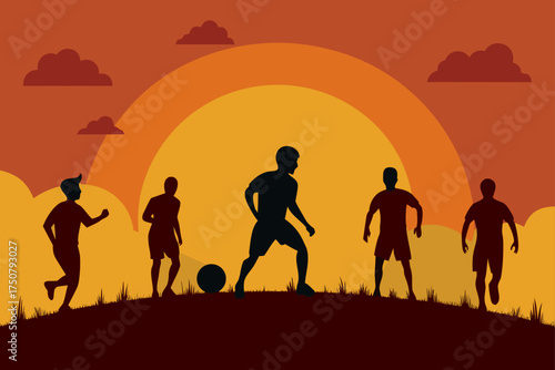 Silhouettes of soccer players playing on a hill at sunset