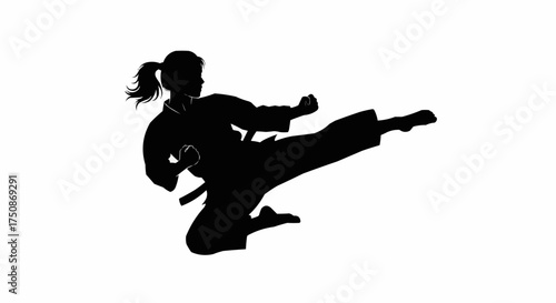 Powerful martial artist striking a dynamic pose, training for self-defense