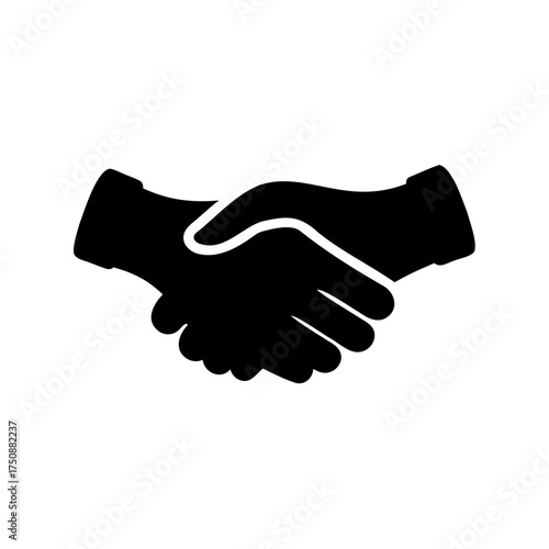 Silhouette of two hands clasped together in a handshake gesture symbolizing agreement