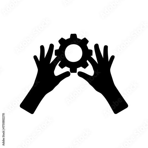 Silhouette of hands holding a cogwheel representing technology and manufacturing