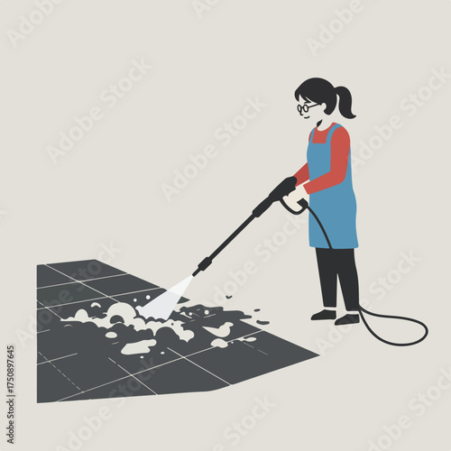 Woman cleans tiled floor with pressure washer