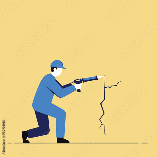 Worker sealing a crack in wall with caulk gun on yellow background, repair concept