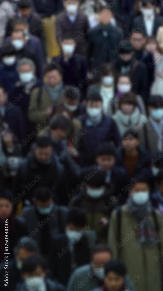 custom made wallpaper toronto digitalVertical shot with no focus of Asian people moving in sync through a packed walkway during Tokyo rush hour, showing impersonal urban life and societal pressure.