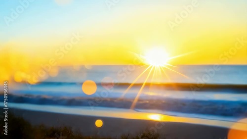 Golden Sun Setting Over A Serene Ocean With Soft Waves And A Sandy Shoreline