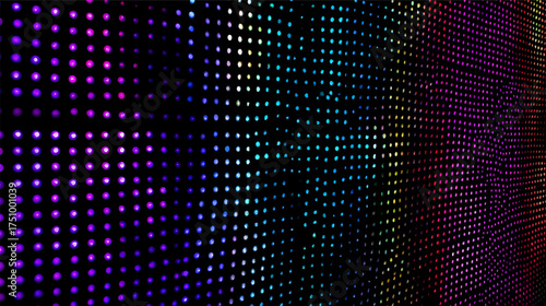 Colorful LED light panel with vibrant dots creating a dynamic pattern. Neon light background