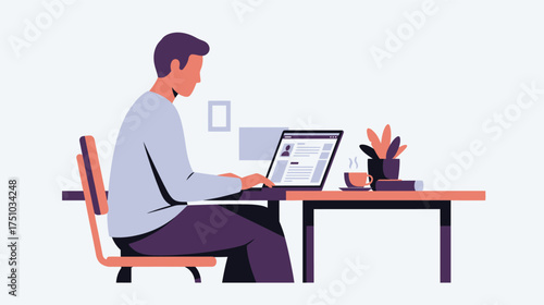 Man working on laptop at desk focused on his work