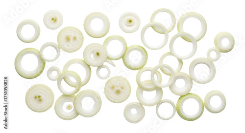 A culinary composition of freshly sliced raw white onion rings arranged in a scattered pattern, viewed from above and isolated on a clean white background